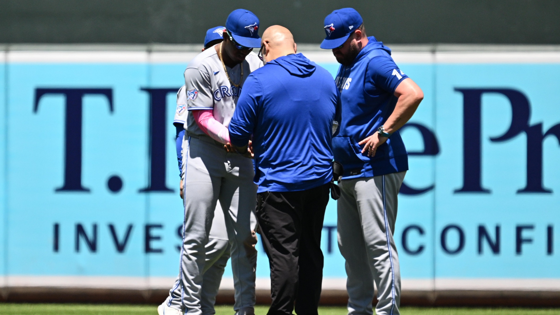 Jes&uacute;s S&aacute;nchez #12 of the Toronto Blue Jays is checked by a trainer after a ball thrown from the outfield stands struck him in the sixth inning against the Baltimore Orioles at Oriole Park at Camden Yards on May 31, 2026 in Baltimore, Maryland. S&aacute;nchez would leave the game after the incident. (Photo by Jamie Sabau/Getty Images)
