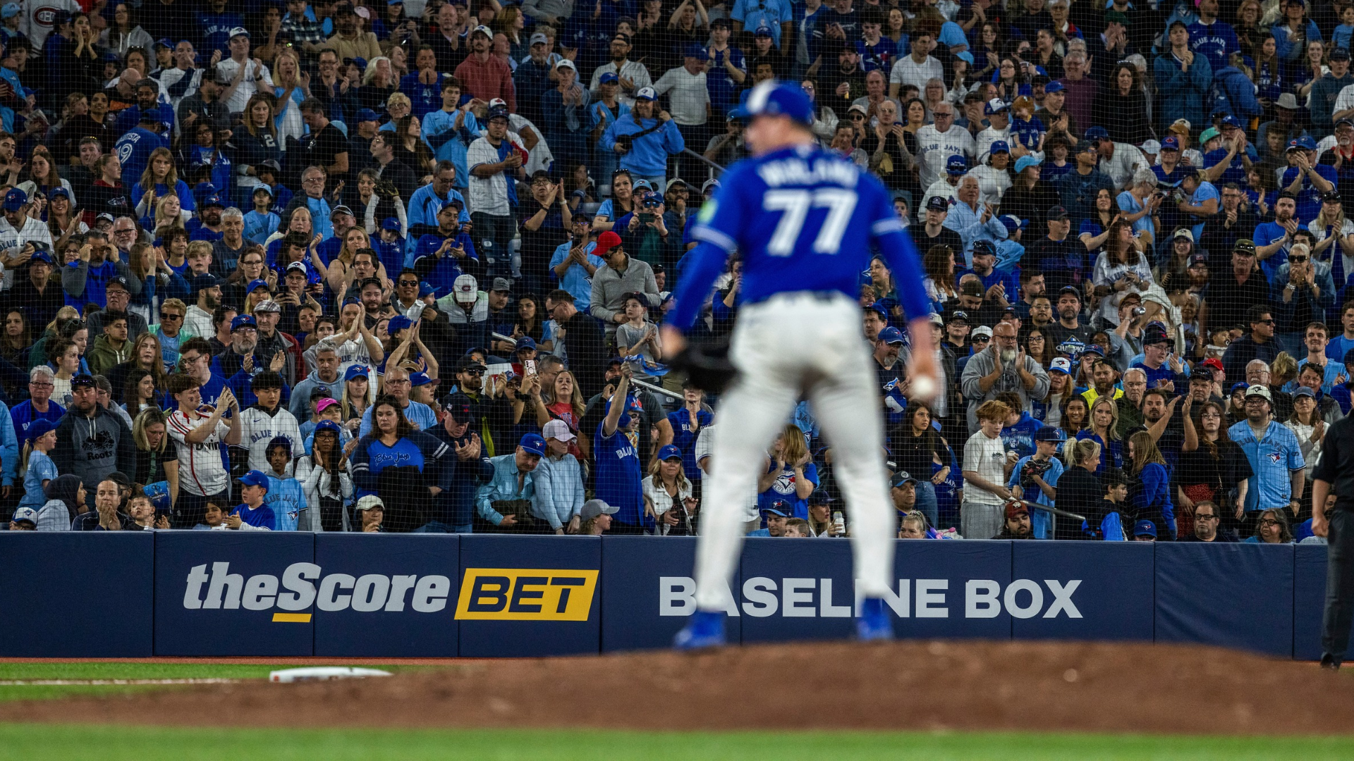 Fans cheer on Louis Varland #77 of the Toronto Blue Jays during the ninth inning against the Cleveland Guardians at the Rogers Centre on April 26, 2026 in Toronto, Canada. (Photo by Tara Walton/Getty Images)