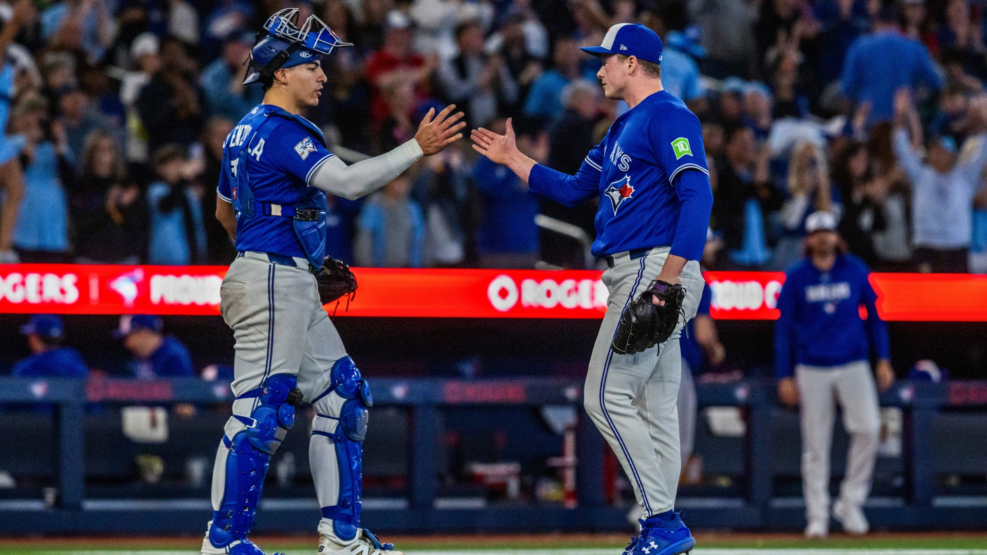 Louis Varland #77 and Brandon Valenzuela #59 of the Toronto Blue Jays celebrate their 4-2 win over the Cleveland Guardians at the Rogers Centre on April 26, 2026 in Toronto, Canada. (Photo by Tara Walton/Getty Images)