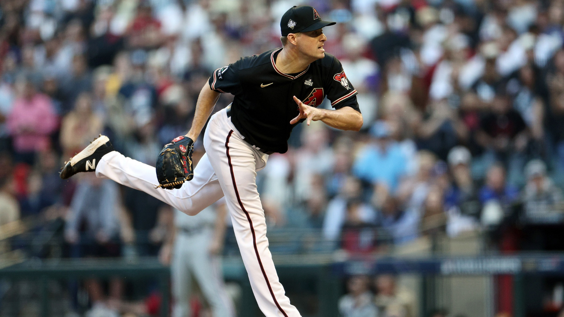 Joe Mantiply #35 of the Arizona Diamondbacks pitches in the first inning against the Texas Rangers during Game Four of the World Series at Chase Field on October 31, 2023 in Phoenix, Arizona. (Photo by Harry How/Getty Images)