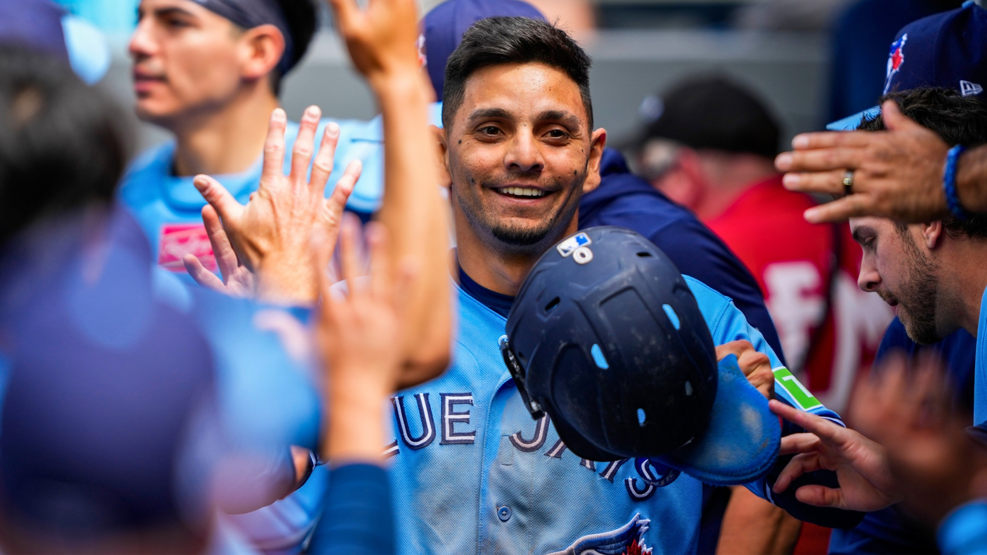 Andr&eacute;s Gim&eacute;nez #0 of the Toronto Blue Jays celebrates scoring against the Baltimore Orioles during the sixth inning with teammates at Rogers Centre on June 7, 2026 in Toronto, Canada. (Photo by Kevin Sousa/Getty Images)