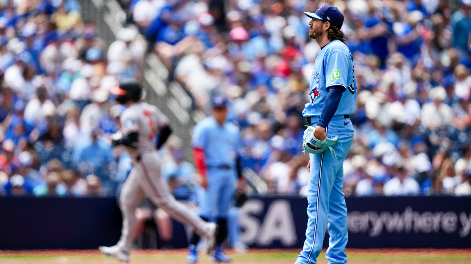 Kevin Gausman #34 of the Toronto Blue Jays reacts after giving up a home run to Taylor Ward #3 of the Baltimore Orioles who runs third base during the fifth inning at Rogers Centre on June 7, 2026 in Toronto, Canada. (Photo by Kevin Sousa/Getty Images)
