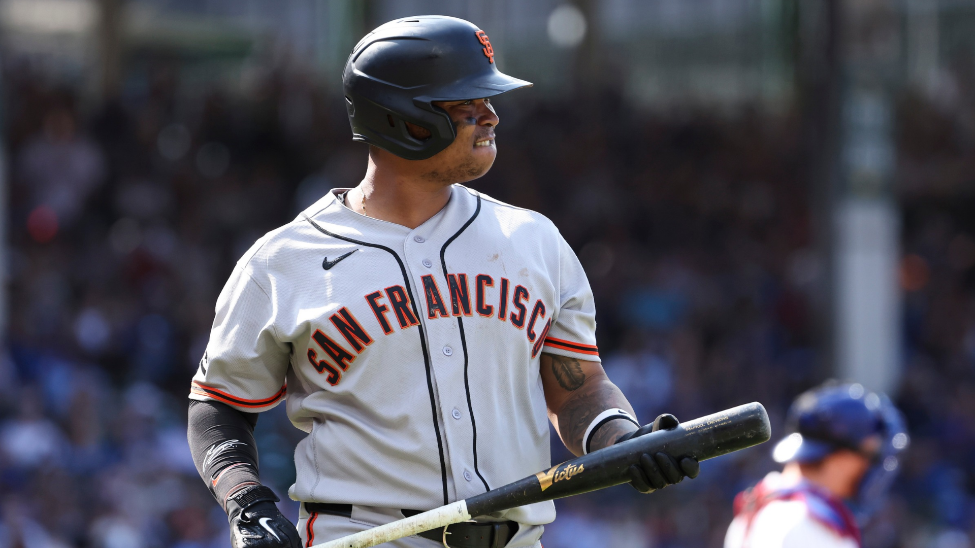Rafael Devers #16 of the San Francisco Giants reacts after being called out on strikes in the tenth inning against the Chicago Cubs at Wrigley Field on June 06, 2026 in Chicago, Illinois. (Photo by Sage Zipeto/Getty Images)