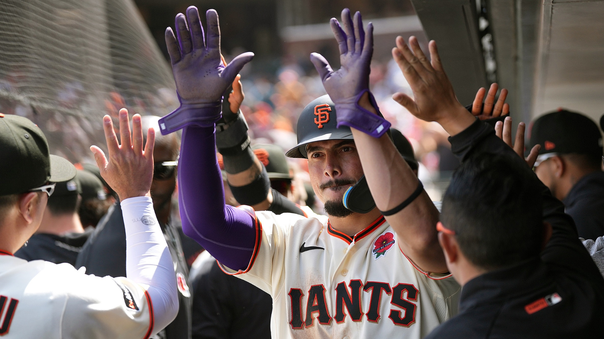 Willy Adames #2 of the San Francisco Giants is congratulated by teammates after he scored against the Arizona Diamondbacks in the bottom of the fourth inning at Oracle Park on May 25, 2026 in San Francisco, California. (Photo by Thearon W. Henderson/Getty Images)