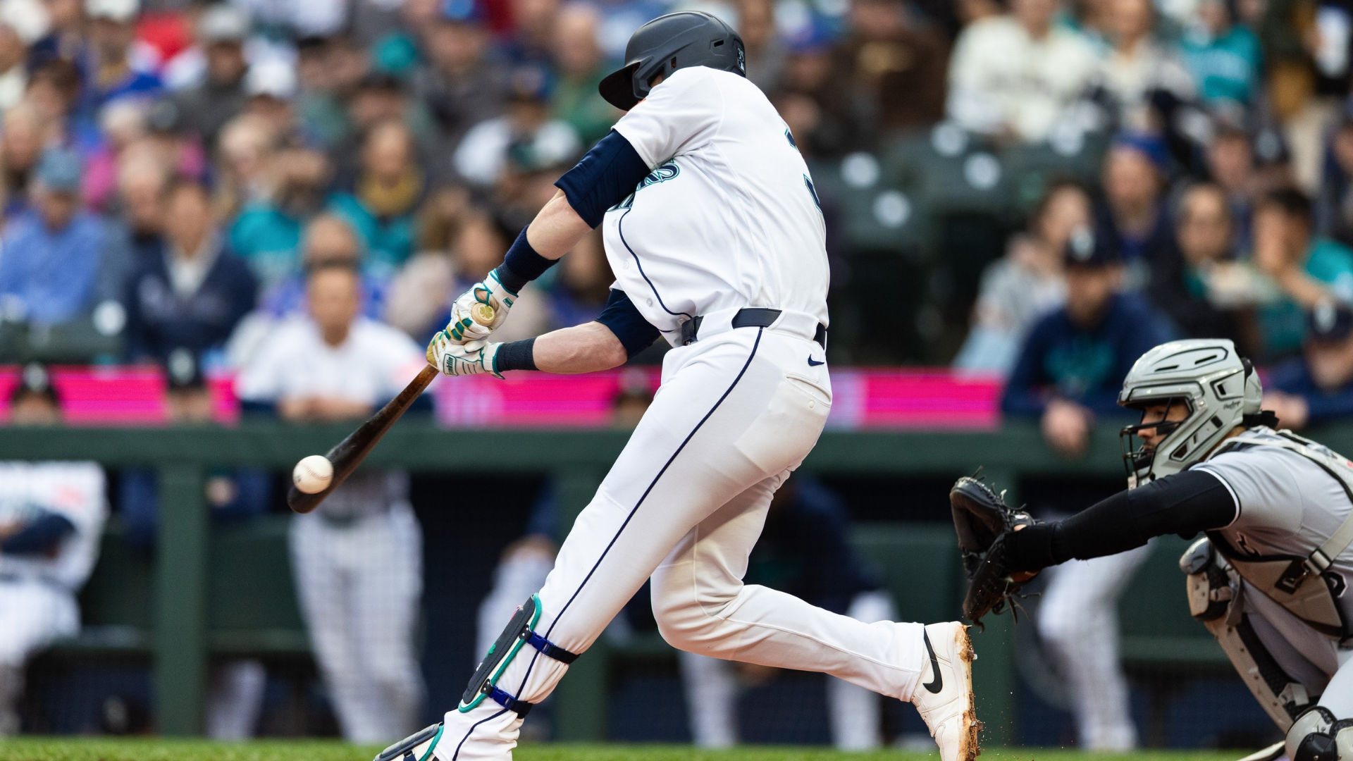 Patrick Wisdom #35 of the Seattle Mariners hits an RBI single during the first inning against the Chicago White Sox at T-Mobile Park on May 19, 2026 in Seattle, Washington. (Photo by Maddy Grassy/Getty Images)