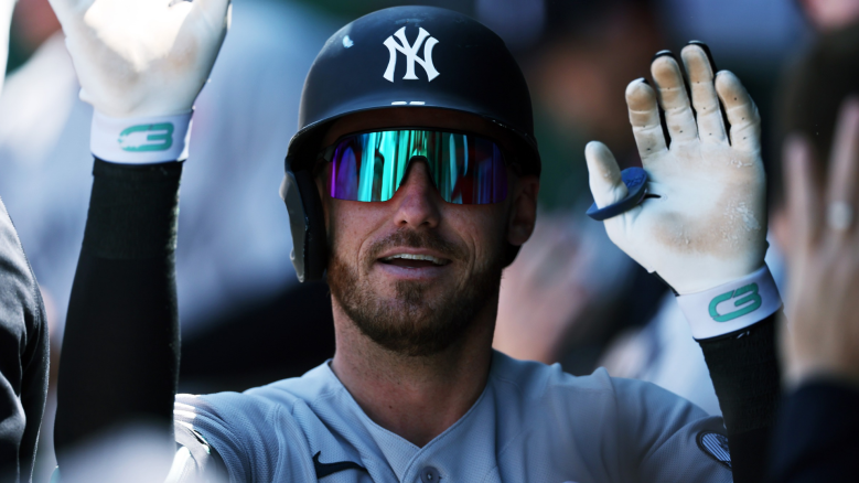 Left fielder Cody Bellinger #35 of the New York Yankees is congratulated by teammates in the dugout after hitting a home run during the 2nd inning of the game against the Kansas City Royals at Kauffman Stadium on May 25, 2026 in Kansas City, Missouri. (Photo by Jamie Squire/Getty Images)