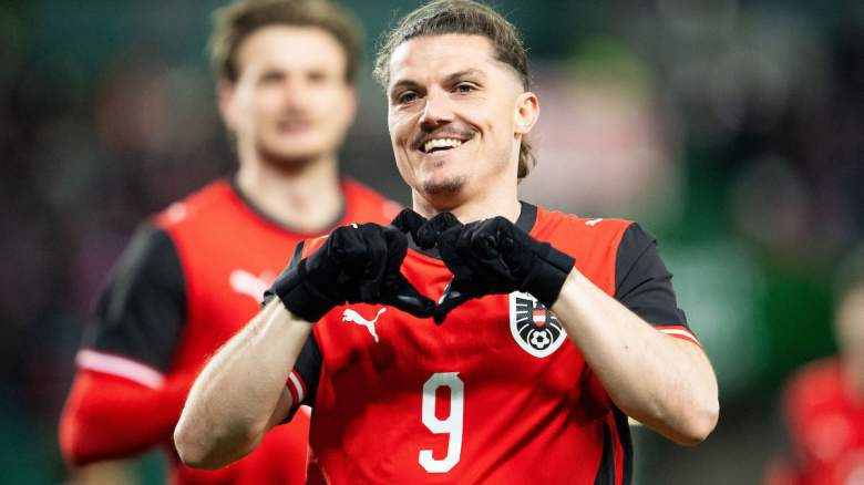 Austria's midfielder #09 Marcel Sabitzer celebrates .