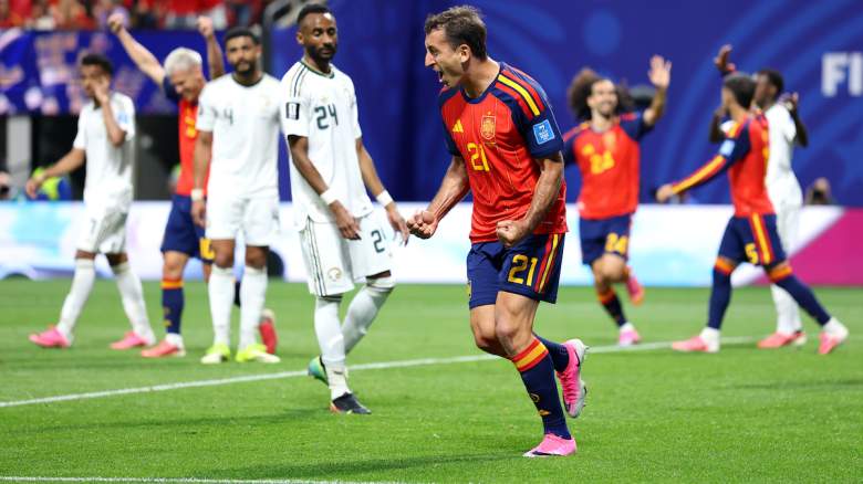Mikel Oyarzabal #21 of Spain celebrates.
