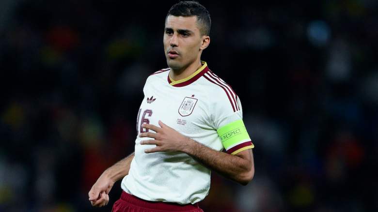 Rodri of Spain looks on.