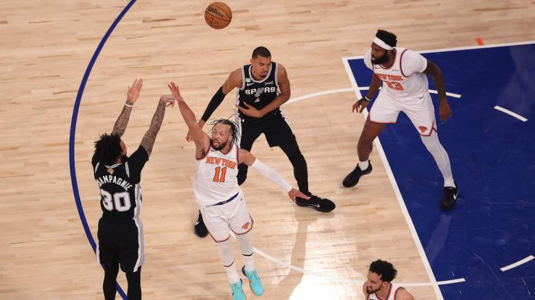 Julian Champagnie #30 of the San Antonio Spurs shoots a three point basket