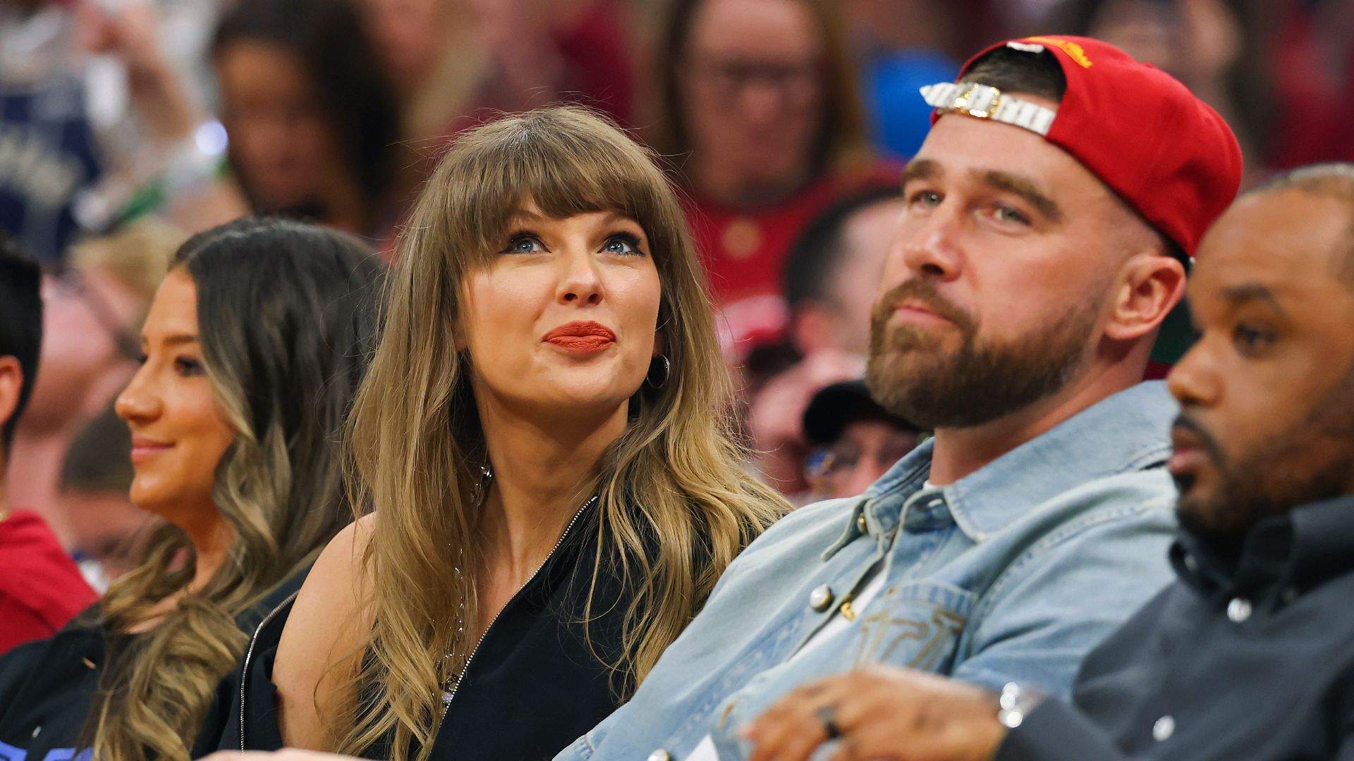 Taylor Swift and Travis Kelce of the Kansas City Chiefs attend Game Three between the New York Knicks and the Cleveland Cavaliers in the NBA Eastern Conference Finals at Rocket Arena on May 23, 2026 in Cleveland, Ohio