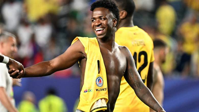 Brazil's forward #07 Vinicius Junior smiles.