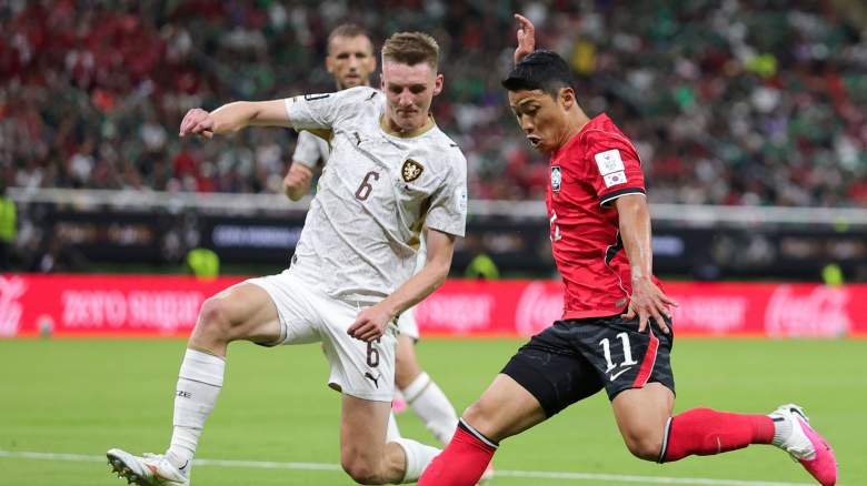 Hwang Hee-Chan #11 of Korea Republic advances the ball against Štěpán Chaloupek #6 of Czechia during the FIFA World Cup 2026 Group A match between Korea Republic and Czechia at Guadalajara Stadium on June 11, 2026 in Zapopan, Mexico