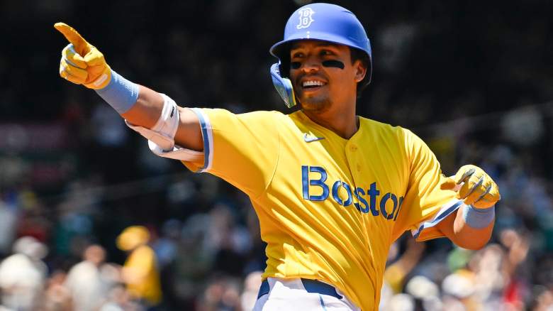 Anthony Seigler #48 of the Boston Red Sox reacts after hitting a solo home run.