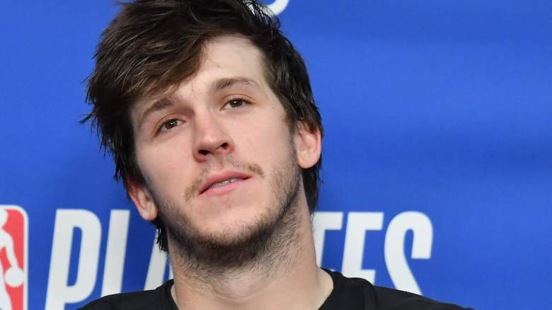 Austin Reaves #15 of the Los Angeles Lakers speaks to the media.