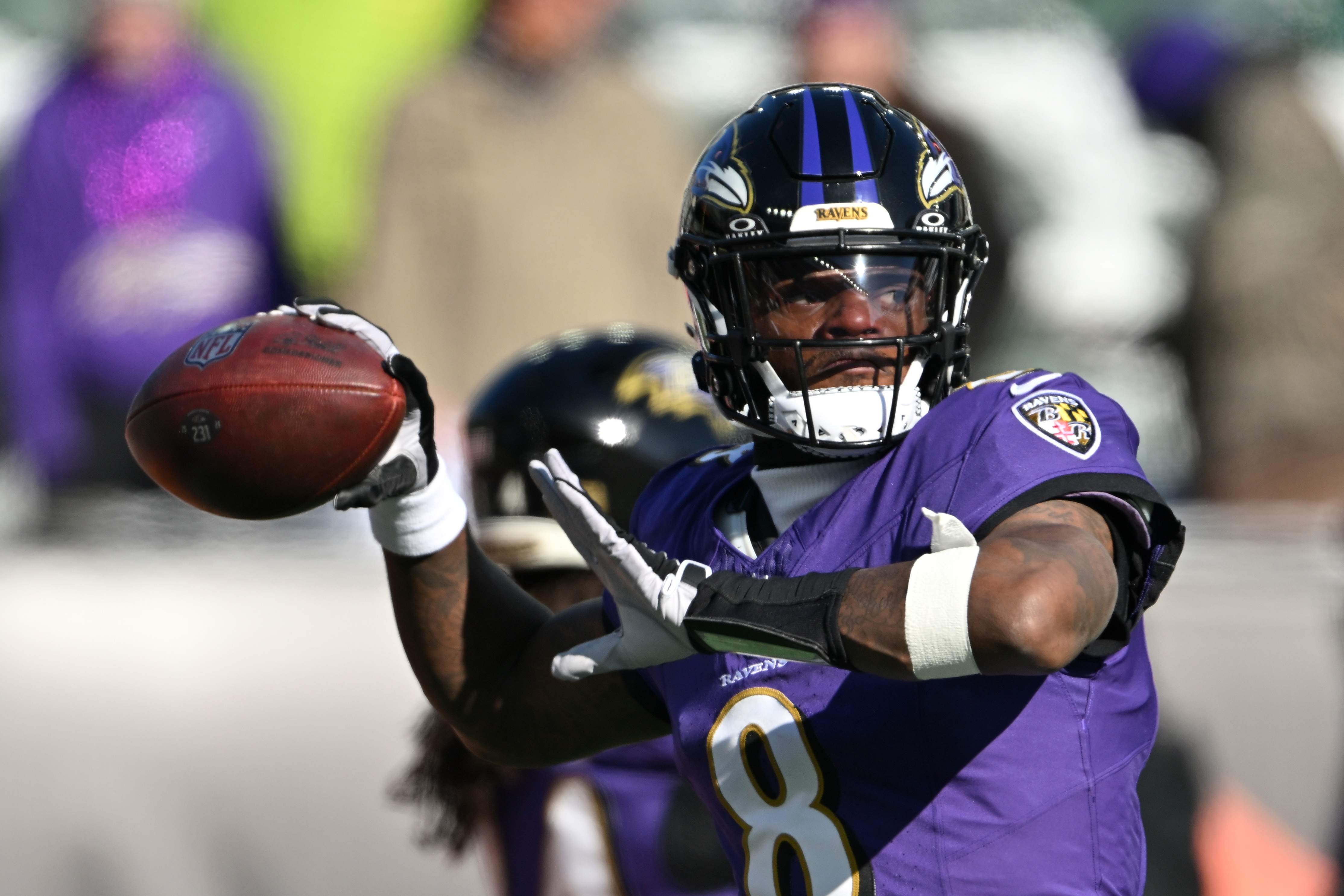 Lamar Jackson earns praise, Ravens star faces debate in Top NFL 100 rankings.