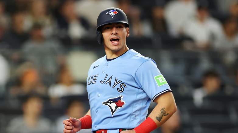 Toronto Blue Jays catcher Brandon Valenzuela scores on a sacrifice fly against the New York Yankees at Yankee Stadium on May 20, 2026.