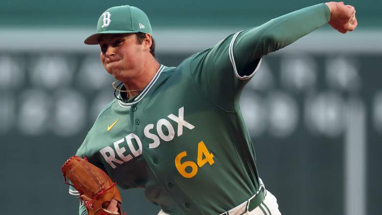 Starting pitcher Jake Bennett #64 of the Boston Red Sox throws.