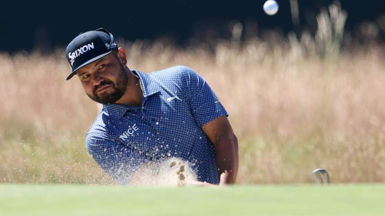 J.J. Spaun of the United States plays a shot from a bunker.