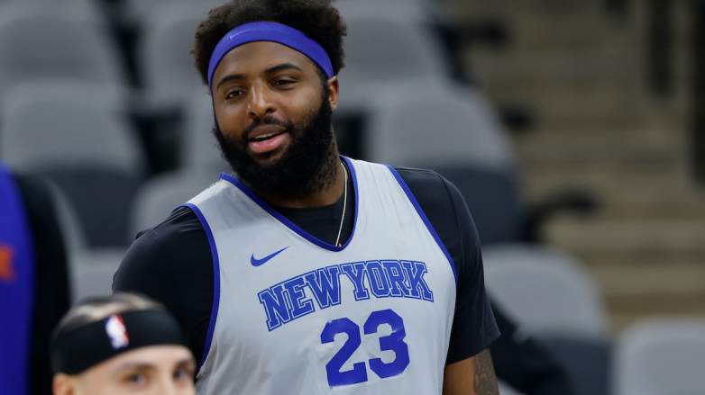 Mitchell Robinson #23 of the New York Knicks watches practice.
