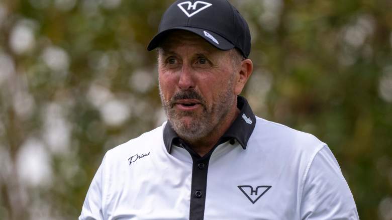 Phil Mickelson reacts during a LIV Golf event as an earlier allegation involving Pat Perez draws renewed attention following a new controversy.