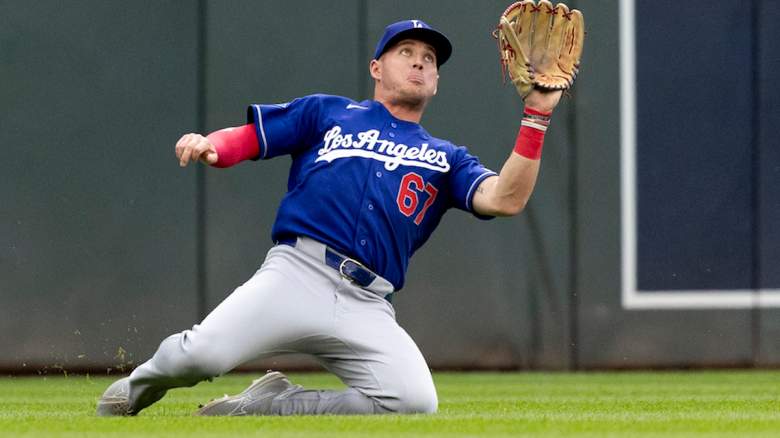 Ryan Ward #67 of the Los Angeles Dodgers makes a sliding catch.