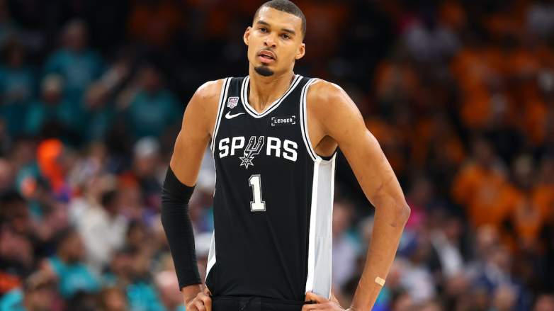 Victor Wembanyama #1 of the San Antonio Spurs reacts.
