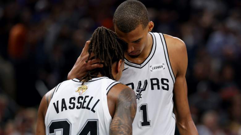 Devin Vassell #24 and Victor Wembanyama #1 of the San Antonio Spurs react during the fourth quarter.