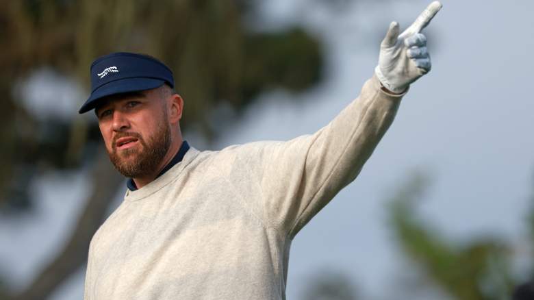 Travis Kelce reacts to his shot from the second tee.