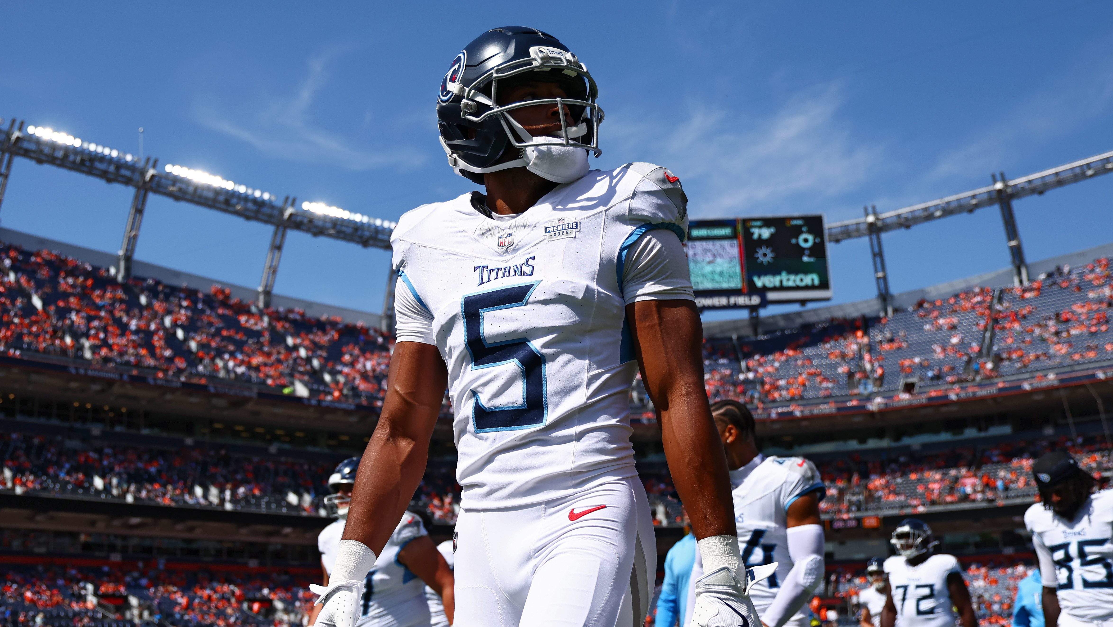 Tennessee Titans wide receiver number 5 stands on the sideline during a game at the stadium.
