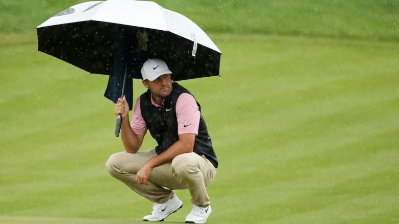 Scottie Scheffler of the United States looks on from the 13th green.