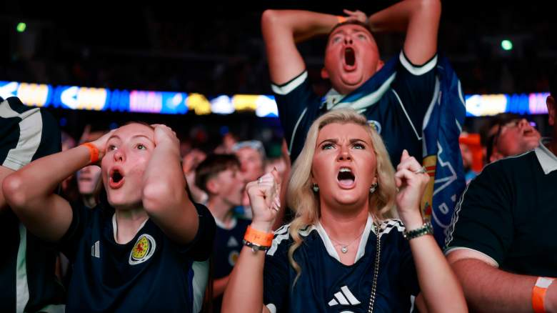 Scotland fans react as they watch the World Cup.