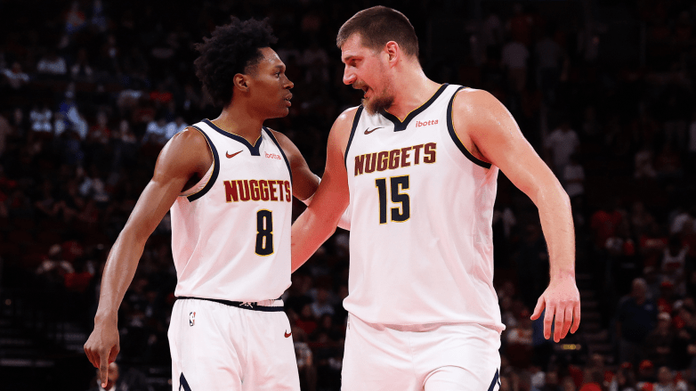 Peyton Watson and Nikola Jokic