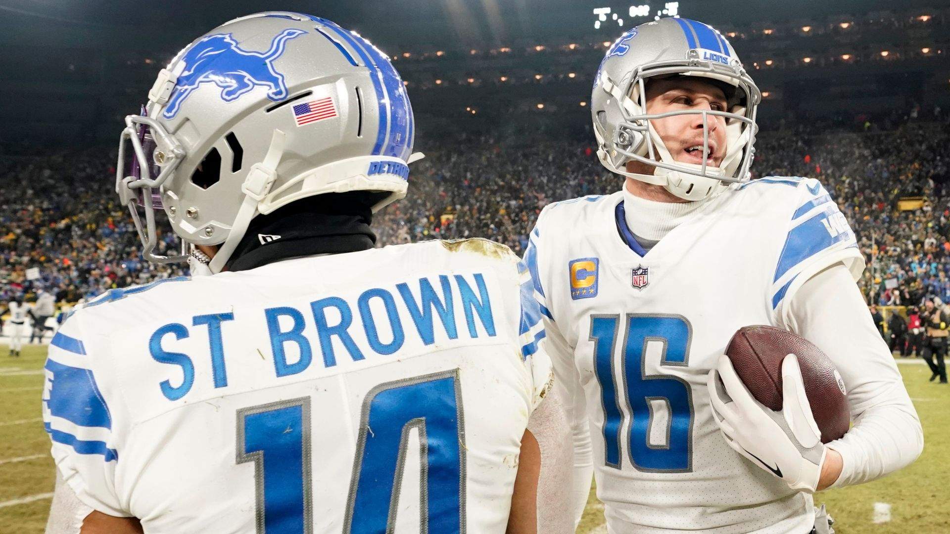 Amon-Ra St. Brown and Jared Goff