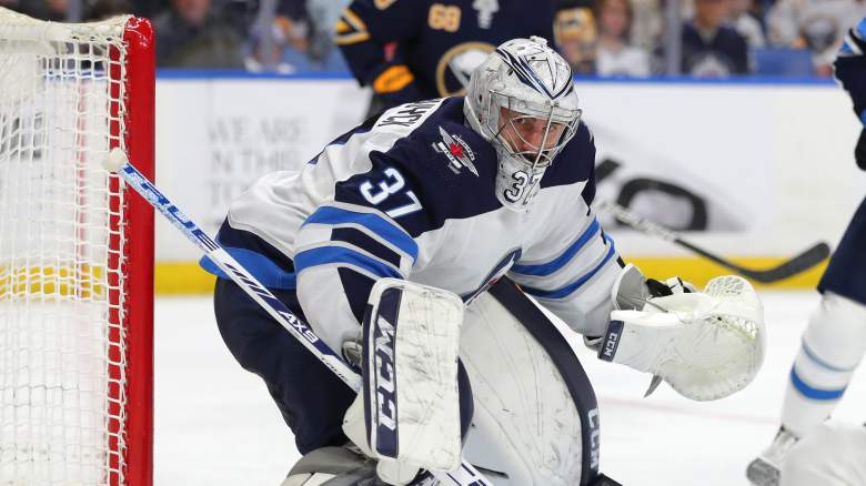 Connor Hellebuyck #37 of the Winnipeg Jets looks for the puck during the second period against the Buffalo Sabres at KeyBank Center on February 23, 2020 in Buffalo, New York.