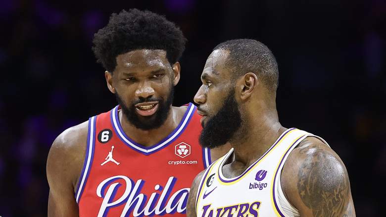 Philadelphia 76ers star Joel Embiid speaks with LeBron James during a game against the Los Angeles Lakers.