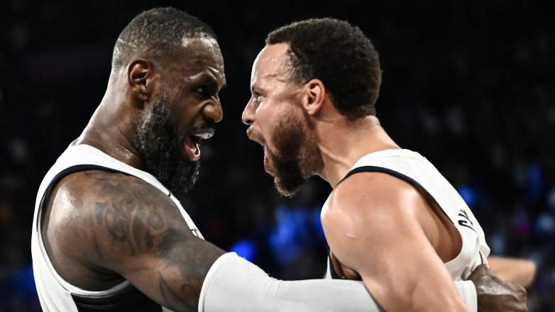 LeBron James celebrates with Stephen Curry after Team USA defeated Serbia in the Olympic semifinal.