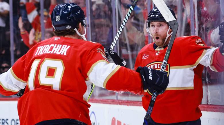 Sam Bennett #9 of the Florida Panthers reacts with Matthew Tkachuk #19 after scoring a goal during the first period against the Boston Bruins. at Amerant Bank Arena on October 08, 2024 in Sunrise, Florida.