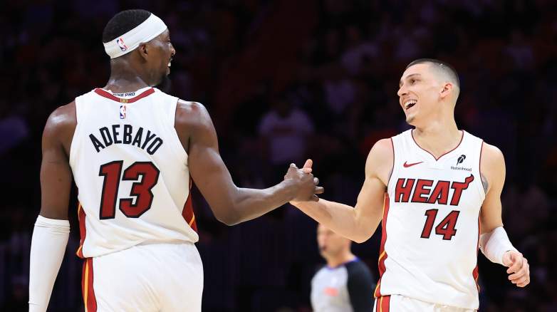 Bam Adebayo and Tyler Herro celebrate during their time as teammates with the Miami Heat.