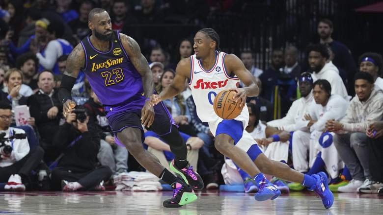 LeBron James defends Philadelphia 76ers guard Tyrese Maxey during an NBA game as the Sixers remain in the LeBron James next team sweepstakes.