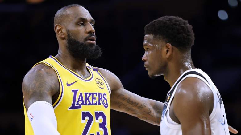 LeBron James and Anthony Edwards talk during an NBA game between the Lakers and Timberwolves.