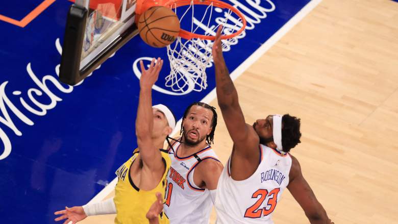 Jalen Brunson and Mitchell Robinson defend during a New York Knicks game.