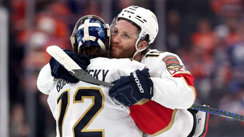 Sergei Bobrovsky #72 and Matthew Tkachuk #19 of the Florida Panthers celebrate after Brad Marchand #63 of the Florida Panthersscored to beat the Edmonton Oilers 5-4 during the second overtime period in Game Two of the 2025 Stanley Cup Final at Rogers Place on June 06, 2025 in Edmonton, Alberta, Canada