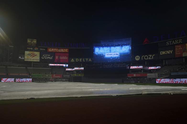 Find out why the Yankees-Dodgers game is delayed today, the latest weather updates, and when it's expected to resume.