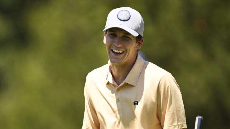 Austin Reaves smiles during a round of golf after signing his historic Lakers contract.