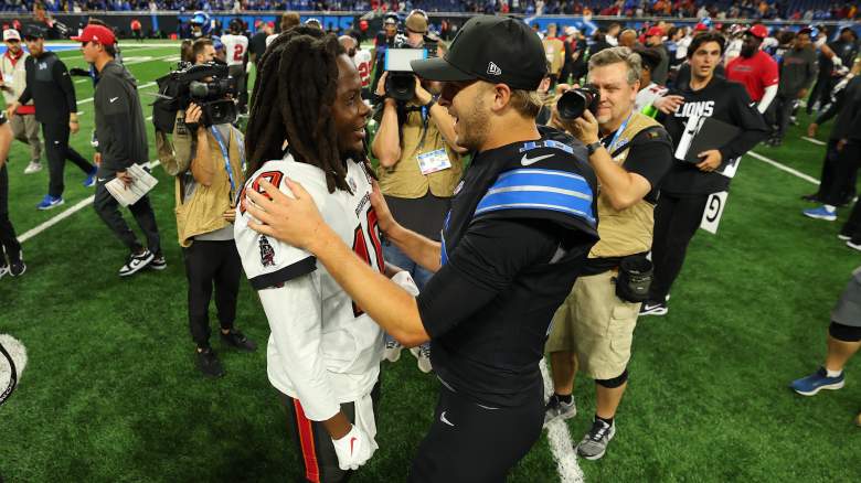 Teddy Bridgewater #10 of the Tampa Bay Buccaneers and Jared Goff #16 of the Detroit Lions speak after the game at Ford Field on October 20, 2025 in Detroit, Michigan.