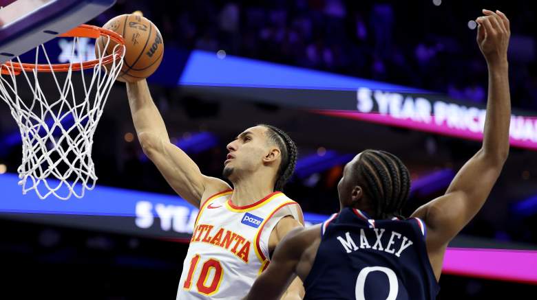 Atlanta Hawks forward Zaccharie Risacher drives to the basket during an NBA game against the Philadelphia 76ers.