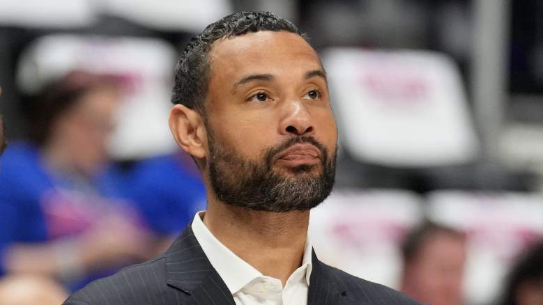 Detroit Pistons president of basketball operations Trajan Langdon stands courtside before an NBA playoff game.