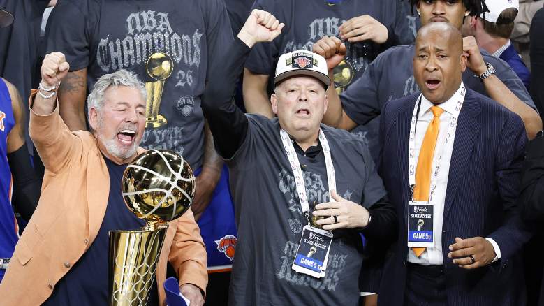 James Dolan, Leon Rose and William Wesley celebrate after the Knicks won the 2026 NBA championship.