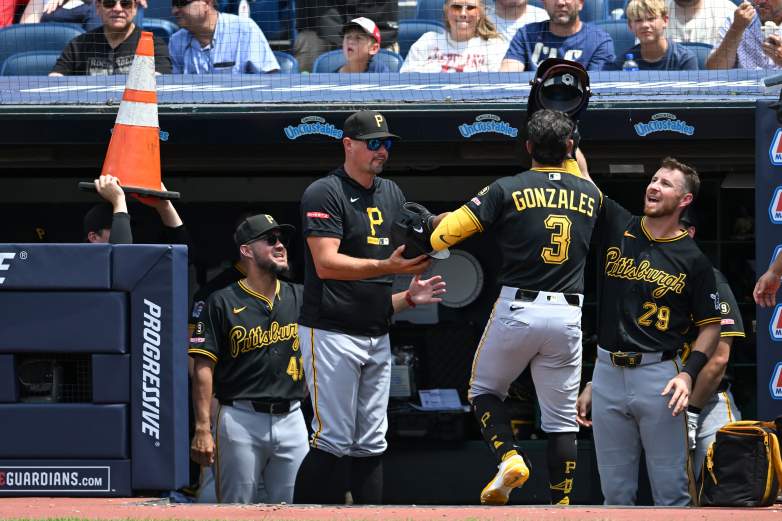 CLEVELAND, OHIO - JULY 18: Manager Don Kelly #12, Nick Gonzales #3 and Ryan O'Hearn #29 of the Pittsburgh Pirates celebrate a solo home run hit by Gonzales during the sixth inning in game one of a doubleheader against the Cleveland Guardians at Progressive Field on July 18, 2026 in Cleveland, Ohio. (Photo by Nick Cammett/Getty Images)